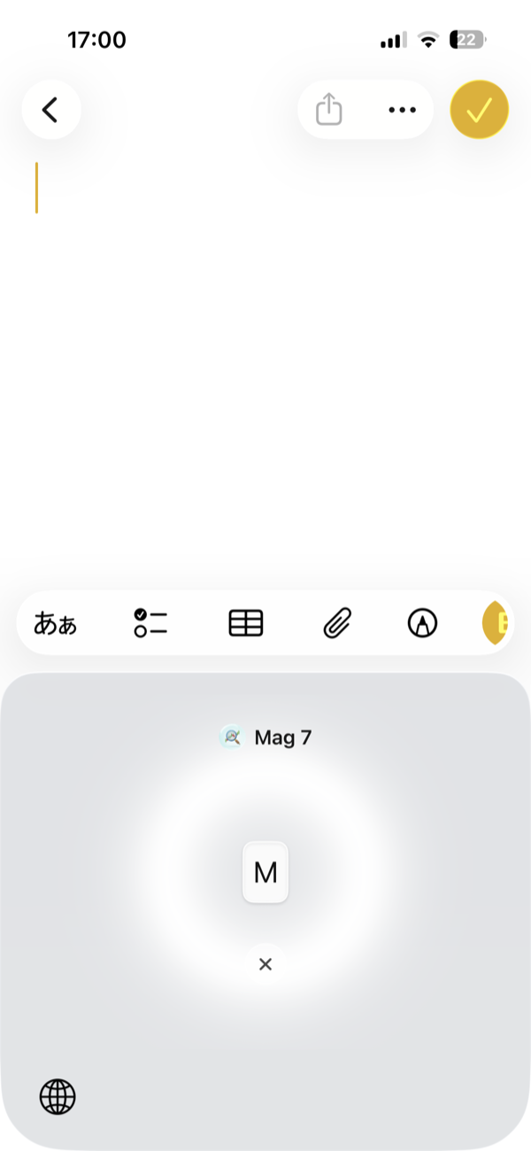 空のメモで M のキーを長押しした状態。キーボードの中央に Mag 7 と M のキー、その下に × が出ている